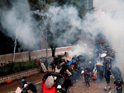 Police fire water cannon, teargas as Hong Kong protest heats up | Police fire water cannon, teargas as Hong Kong protest heats up
