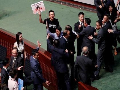 Carrie Lam aborts policy speech as Hong Kong lawmakers disrupt session | Carrie Lam aborts policy speech as Hong Kong lawmakers disrupt session