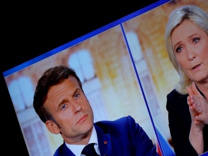 France's Macron accuses rival Le Pen of being 'dependent' on Russia | France's Macron accuses rival Le Pen of being 'dependent' on Russia