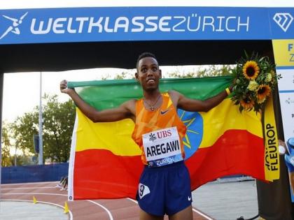 Ethiopia's Ejegayehu Taye, Berihu Aregawi break 5km world records in Barcelona | Ethiopia's Ejegayehu Taye, Berihu Aregawi break 5km world records in Barcelona