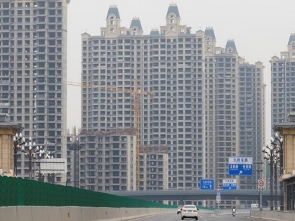 China's property giant Evergrande starts repayment plan as pressure mounts over unpaid loans | China's property giant Evergrande starts repayment plan as pressure mounts over unpaid loans