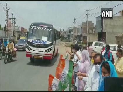 Buses arranged by Congress leave for UP with migrant workers | Buses arranged by Congress leave for UP with migrant workers Buses arranged by Congress leave for UP with migrant workers | Buses arranged by Congress leave for UP with migrant workers