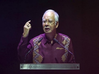 Former Malaysian PM pleads not guilty in 1MDB-linked graft case | Former Malaysian PM pleads not guilty in 1MDB-linked graft case