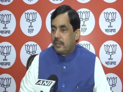 Send delegation to meet Obama and present views on Rahul Gandhi: Shahnawaz Hussain takes dig at Shiv Sena | Send delegation to meet Obama and present views on Rahul Gandhi: Shahnawaz Hussain takes dig at Shiv Sena Send delegation to meet Obama and present views on Rahul Gandhi: Shahnawaz Hussain takes dig at Shiv Sena | Send delegation to meet Obama and present views on Rahul Gandhi: Shahnawaz Hussain takes dig at Shiv Sena