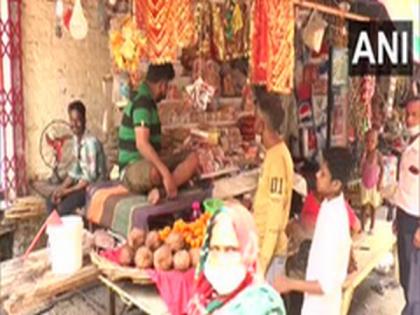 Flower sellers at UP temple helpless after govt bans physical offerings | Flower sellers at UP temple helpless after govt bans physical offerings Flower sellers at UP temple helpless after govt bans physical offerings | Flower sellers at UP temple helpless after govt bans physical offerings