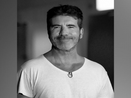 Simon Cowell 'healing at home' with broken arm following bike accident | Simon Cowell 'healing at home' with broken arm following bike accident