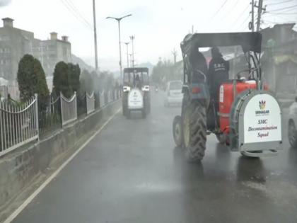SMC launches drive to sanitise Srinagar with boom sprayers | SMC launches drive to sanitise Srinagar with boom sprayers