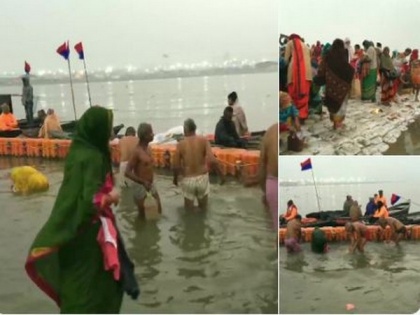 Devotees take holy dip, offer prayers at Sangam River in Prayagraj on auspicious Paush Purnima | Devotees take holy dip, offer prayers at Sangam River in Prayagraj on auspicious Paush Purnima