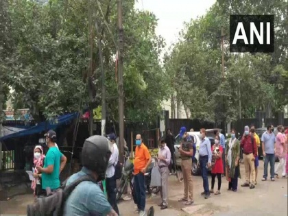 Queues outside COVID-19 vaccination centres in UP's Noida, Ghaziabad | Queues outside COVID-19 vaccination centres in UP's Noida, Ghaziabad