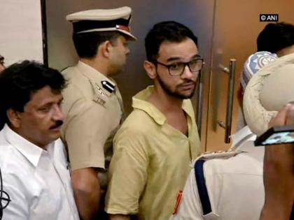Court seeks response from DG (Prisons) on Umar Khalid's plea over being produced in handcuffs | Court seeks response from DG (Prisons) on Umar Khalid's plea over being produced in handcuffs