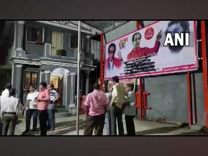 Maha political crisis: Eknath Shinde's supporters blacken posters of CM Uddhav Thackeray in Thane | Maha political crisis: Eknath Shinde's supporters blacken posters of CM Uddhav Thackeray in Thane