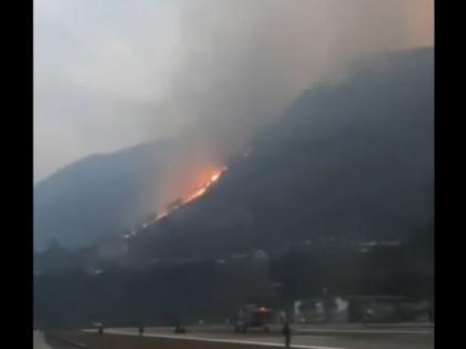 IAF helicopters drop 1.39 lakh litres of water to douse AP's Walong blaze, continue high-risk firefighting in Nagaland's Dzukou Valley | IAF helicopters drop 1.39 lakh litres of water to douse AP's Walong blaze, continue high-risk firefighting in Nagaland's Dzukou Valley IAF helicopters drop 1.39 lakh litres of water to douse AP's Walong blaze, continue high-risk firefighting in Nagaland's Dzukou Valley | IAF helicopters drop 1.39 lakh litres of water to douse AP's Walong blaze, continue high-risk firefighting in Nagaland's Dzukou Valley