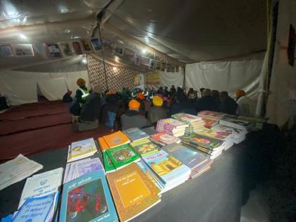 Makeshift library set up at Singhu border, amid farmers' protests | Makeshift library set up at Singhu border, amid farmers' protests Makeshift library set up at Singhu border, amid farmers' protests | Makeshift library set up at Singhu border, amid farmers' protests