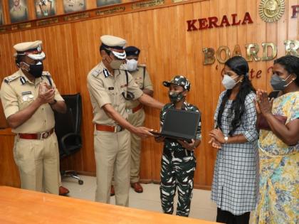 Kerala Police gifts laptop to 11-year-old Abhijit, who helps his grandmother earn living by selling fish | Kerala Police gifts laptop to 11-year-old Abhijit, who helps his grandmother earn living by selling fish