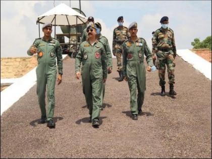 Lieutenant General AK Suri carries out live firing from Rudra Helicopter | Lieutenant General AK Suri carries out live firing from Rudra Helicopter