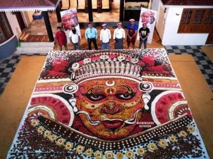 Kerala: Artist creates 24-foot-long Theyyam's face using bakery products | Kerala: Artist creates 24-foot-long Theyyam's face using bakery products