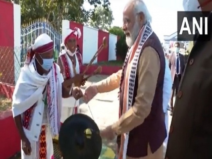 Manipur: PM Modi tries his hand at playing traditional musical instruments during visit to Imphal | Manipur: PM Modi tries his hand at playing traditional musical instruments during visit to Imphal