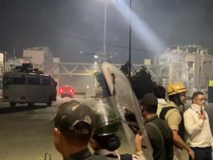 Police open fire in the air after mob tries to snatch arms in Imphal, curfew relaxation cancelled | Police open fire in the air after mob tries to snatch arms in Imphal, curfew relaxation cancelled Police open fire in the air after mob tries to snatch arms in Imphal, curfew relaxation cancelled | Police open fire in the air after mob tries to snatch arms in Imphal, curfew relaxation cancelled