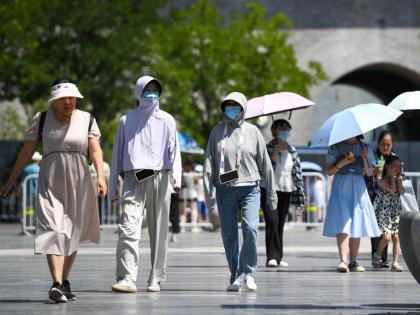 2 dead as heat wave continues in north China | 2 dead as heat wave continues in north China