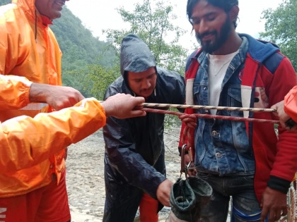 NDRF evacuates 6 stranded persons across swollen river in Himachal | NDRF evacuates 6 stranded persons across swollen river in Himachal