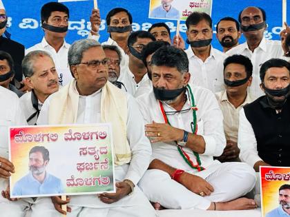 K'taka Cong on silent protest in B’luru against BJP's 'conspiracy' to end Rahul's career | K'taka Cong on silent protest in B’luru against BJP's 'conspiracy' to end Rahul's career