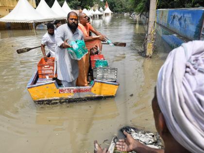 Powerlifter-turned-shooter Gaurav Sharma distributes food items to flood-affected people in Delhi | Powerlifter-turned-shooter Gaurav Sharma distributes food items to flood-affected people in Delhi Powerlifter-turned-shooter Gaurav Sharma distributes food items to flood-affected people in Delhi | Powerlifter-turned-shooter Gaurav Sharma distributes food items to flood-affected people in Delhi