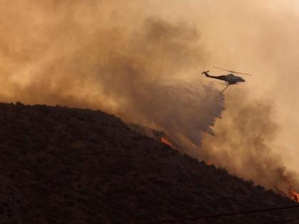 Air Force base, settlements evacuated in Greece as wildfires rage | Air Force base, settlements evacuated in Greece as wildfires rage