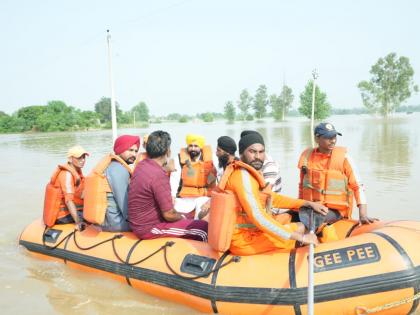 Riding boat, Punjab CM visits flood-hit areas | Riding boat, Punjab CM visits flood-hit areas Riding boat, Punjab CM visits flood-hit areas | Riding boat, Punjab CM visits flood-hit areas