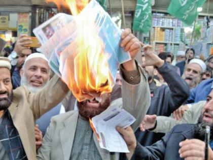Pakistanis burn electricity bills, protest against imposed taxes | Pakistanis burn electricity bills, protest against imposed taxes Pakistanis burn electricity bills, protest against imposed taxes | Pakistanis burn electricity bills, protest against imposed taxes