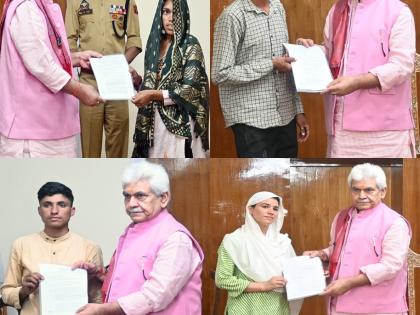 J&K L-G hands over appointment letters to kin of civilians killed | J&K L-G hands over appointment letters to kin of civilians killed J&K L-G hands over appointment letters to kin of civilians killed | J&K L-G hands over appointment letters to kin of civilians killed