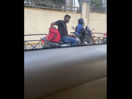 B'luru: Zomato delivery guy seen eating customer's food | B'luru: Zomato delivery guy seen eating customer's food