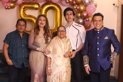 Govinda celebrates wife Sunita's 50th birthday with kids, family | Govinda celebrates wife Sunita's 50th birthday with kids, family