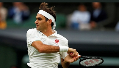 Wimbledon: Lucky Federer enters Round 2 after opponent gets injured | Wimbledon: Lucky Federer enters Round 2 after opponent gets injured