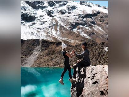 Travel influencer couple called out for 'dangerous' cliff-hanging photo | Travel influencer couple called out for 'dangerous' cliff-hanging photo