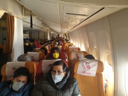 Air India special flight carrying 323 Indians, 7 Maldivians evacuated from Wuhan lands in Delhi | Air India special flight carrying 323 Indians, 7 Maldivians evacuated from Wuhan lands in Delhi