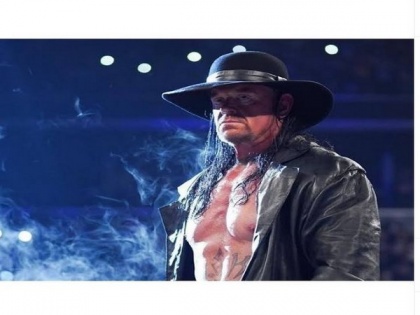 'Grew to admire his skill and athleticism' Varun Dhawan thanks Undertaker for childhood memories | 'Grew to admire his skill and athleticism' Varun Dhawan thanks Undertaker for childhood memories
