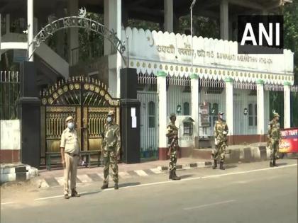 Security personnel stationed outside Athgaon Kabarsthan, Spanish Garden complex in Guwahati to contain spread of COVID-19 | Security personnel stationed outside Athgaon Kabarsthan, Spanish Garden complex in Guwahati to contain spread of COVID-19 Security personnel stationed outside Athgaon Kabarsthan, Spanish Garden complex in Guwahati to contain spread of COVID-19 | Security personnel stationed outside Athgaon Kabarsthan, Spanish Garden complex in Guwahati to contain spread of COVID-19
