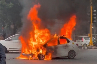 Car catches fire at ITO, no injuries reported | Car catches fire at ITO, no injuries reported