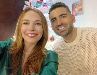 Lindsay Lohan is all smiles with hubby Bader Shammas in Christmas selfie | Lindsay Lohan is all smiles with hubby Bader Shammas in Christmas selfie
