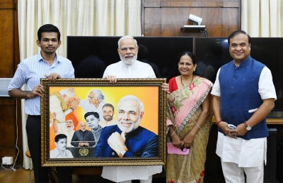 Assam's physically-challenged artist gifts painting to PM Modi | Assam's physically-challenged artist gifts painting to PM Modi