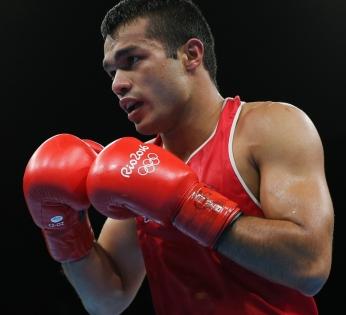 Vikas Krishan's coach stuck in US, boxers seeks MEA's help | Vikas Krishan's coach stuck in US, boxers seeks MEA's help Vikas Krishan's coach stuck in US, boxers seeks MEA's help | Vikas Krishan's coach stuck in US, boxers seeks MEA's help
