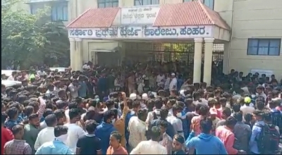 Hijab row: Teargas fired in Karnataka college campus, curfew in one more dist | Hijab row: Teargas fired in Karnataka college campus, curfew in one more dist