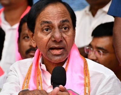 Collector draws ire for touching Telangana CM's feet | Collector draws ire for touching Telangana CM's feet