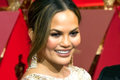 Chrissy Teigen wishes her implants 'Happy 10th Anniversary', but wants them out now | Chrissy Teigen wishes her implants 'Happy 10th Anniversary', but wants them out now