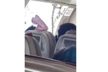 Man aboard S.Korean flight detained for opening plane door | Man aboard S.Korean flight detained for opening plane door