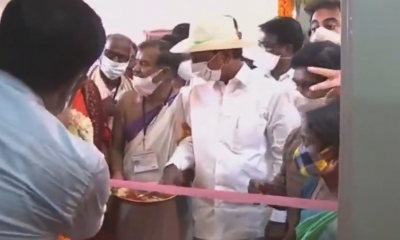 With scissors not available, KCR pulls off ribbon | With scissors not available, KCR pulls off ribbon