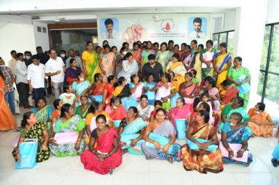 Women's Day: Chiranjeevi felicitates female film production workers | Women's Day: Chiranjeevi felicitates female film production workers