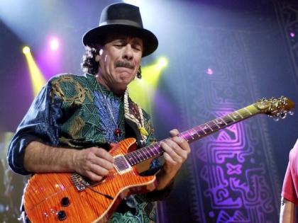 Guitarist Carlos Santana collapses during concert in Michigan | Guitarist Carlos Santana collapses during concert in Michigan