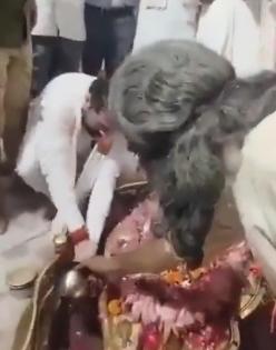 Row over UP minister washing his hands near Shivling | Row over UP minister washing his hands near Shivling Row over UP minister washing his hands near Shivling | Row over UP minister washing his hands near Shivling