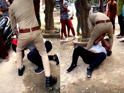 UP Police take suo moto cognizance of viral video, suspend constable for thrashing man | UP Police take suo moto cognizance of viral video, suspend constable for thrashing man UP Police take suo moto cognizance of viral video, suspend constable for thrashing man | UP Police take suo moto cognizance of viral video, suspend constable for thrashing man